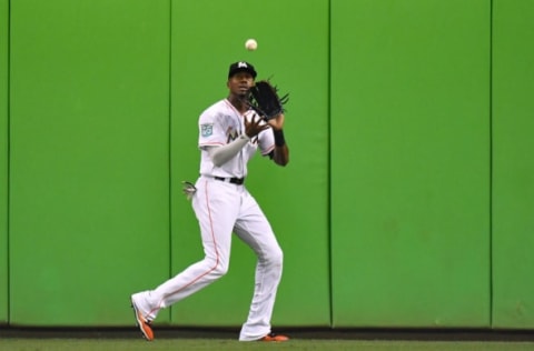 MIAMI, FL – SEPTEMBER 18: Lewis Brinson #9 of the Miami Marlins makes a catch in the outfield in the third inning against the Washington Nationals at Marlins Park on September 18, 2018 in Miami, Florida. (Photo by Mark Brown/Getty Images)