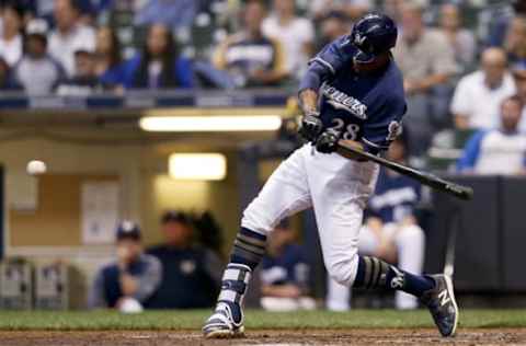 MILWAUKEE, WI – SEPTEMBER 19: Curtis Granderson #28 of the Milwaukee Brewers flies out in the fifth inning against the Cincinnati Reds at Miller Park on September 19, 2018 in Milwaukee, Wisconsin. (Photo by Dylan Buell/Getty Images)