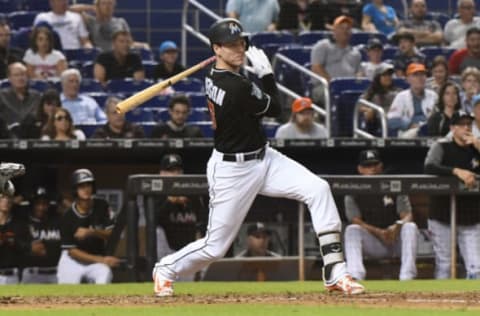 MIAMI, FL – SEPTEMBER 21: Brian Anderson #15 of the Miami Marlins doubles in the 10th inning against the Cincinnati Reds at Marlins Park on September 21, 2018 in Miami, Florida. (Photo by Eric Espada/Getty Images)