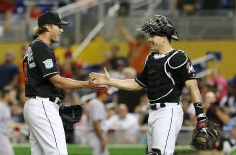 MIAMI, FL – SEPTEMBER 22: Relief pitcher Drew Steckenrider #71 of the Miami Marlins celebrates with catcher J.T. Realmuto #11 after the Marlins defeated the Cincinnati Reds 5-1 at Marlins Park on September 22, 2018 in Miami, Florida. (Photo by Joe Skipper/Getty Images)