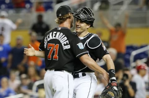 MIAMI, FL – SEPTEMBER 22: Relief pitcher Drew Steckenrider #71 of the Miami Marlins celebrates with catcher J.T. Realmuto #11 after the Marlins defeated the Cincinnati Reds 5-1 at Marlins Park on September 22, 2018 in Miami, Florida. (Photo by Joe Skipper/Getty Images)