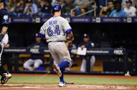 ST PETERSBURG, FL – SEPTEMBER 29: Jon Berti #64 of the Toronto Blue Jays hits a home run in the first inning against Blake Snell #4 of the Tampa Bay Rays on September 29, 2018 at Tropicana Field in St Petersburg, Florida. (Photo by Julio Aguilar/Getty Images)