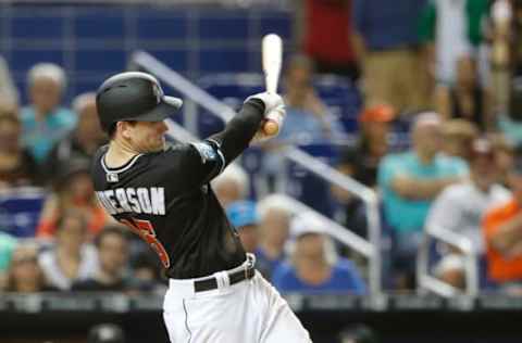 MIAMI, FL – SEPTEMBER 22: Third baseman Brian Anderson #15 of the Miami Marlins hits an RBI double in the sixth inning against the Cincinnati Reds at Marlins Park on September 22, 2018 in Miami, Florida. (Photo by Joe Skipper/Getty Images)