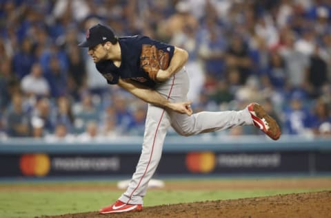 LOS ANGELES, CA – OCTOBER 26: Nathan Eovaldi #17 of the Boston Red Sox delivers the pitch during the thirteenth inning against the Los Angeles Dodgers in Game Three of the 2018 World Series at Dodger Stadium on October 26, 2018 in Los Angeles, California. (Photo by Ezra Shaw/Getty Images)