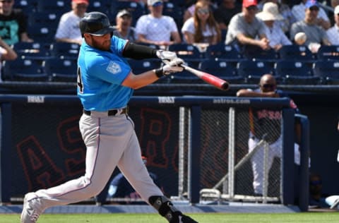 WEST PALM BEACH, FL – FEBRUARY 28: Austin Dean #44 of the Miami Marlins doubles in the fifth inning against the Houston Astros at The Ballpark of the Palm Beaches on February 28, 2019 in West Palm Beach, Florida. (Photo by Mark Brown/Getty Images)