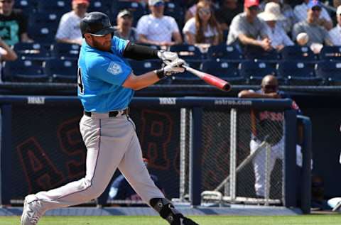 WEST PALM BEACH, FL – FEBRUARY 28: Austin Dean #44 of the Miami Marlins doubles in the fifth inning against the Houston Astros at The Ballpark of the Palm Beaches on February 28, 2019 in West Palm Beach, Florida. (Photo by Mark Brown/Getty Images)