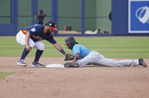 WEST PALM BEACH, FL – MARCH 14: Yadiel Rivera #2 of the Miami Marlins steals second base ahead of the tag by Jack Mayfield #80 of the Houston Astros during a spring training game at The Fitteam Ballpark of the Palm Beaches on March 14, 2019 in West Palm Beach, Florida. (Photo by Joel Auerbach/Getty Images)