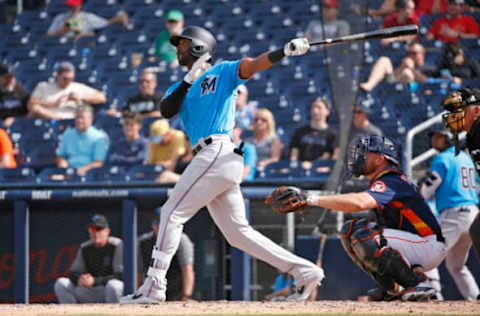 WEST PALM BEACH, FL – MARCH 14: Isaac Galloway #79 of the Miami Marlins hits a triple against the Houston Astros during a spring training game at The Fitteam Ballpark of the Palm Beaches on March 14, 2019 in West Palm Beach, Florida. (Photo by Joel Auerbach/Getty Images)