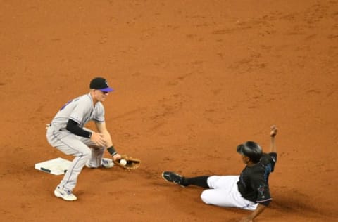 MIAMI, FL – MARCH 29: Curtis Granderson #21 of the Miami Marlins gets caught stealing in the first inning during the game against the Colorado Rockies at Marlins Park on March 29, 2019 in Miami, Florida. (Photo by Mark Brown/Getty Images)