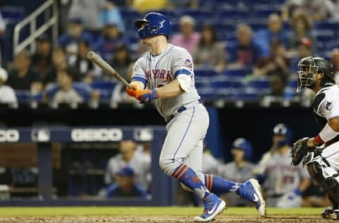 MIAMI, FLORIDA – APRIL 01: Pete Alonso #20 of the New York Mets hits a three-run home run in the ninth inning against the Miami Marlins at Marlins Park on April 01, 2019 in Miami, Florida. (Photo by Michael Reaves/Getty Images)