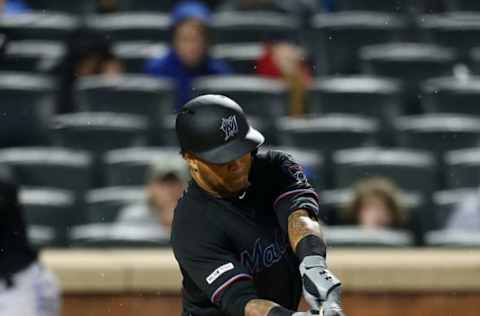 NEW YORK, NEW YORK – MAY 11: Harold Ramirez #47 of the Miami Marlins grounds to third base in the seventh inning during his MLB debut against the New York Mets at Citi Field on May 11, 2019 in New York City. (Photo by Mike Stobe/Getty Images)