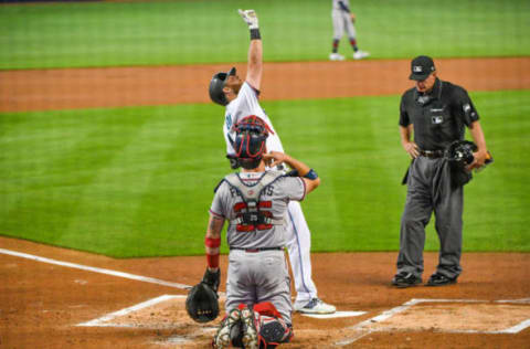 MIAMI, FL – JUNE 09: Austin Dean #44 of the Miami Marlins celebrates at home plate after hitting a home run in the first inning against the Atlanta Braves at Marlins Park on June 9, 2019 in Miami, Florida. (Photo by Mark Brown/Getty Images)