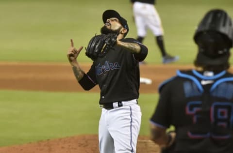 MIAMI, FL – JUNE 28: Sergio Romo #54 of the Miami Marlins points to the sky after defeating the Philadelphia Phillies at Marlins Park on June 28, 2019 in Miami, Florida. (Photo by Eric Espada/Getty Images)