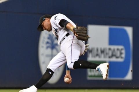 MIAMI, FL – JULY 30: Miguel Rojas #19 of the Miami Marlins fields the ball in the sixth inning against the Minnesota Twins at Marlins Park on July 30, 2019 in Miami, Florida. (Photo by Mark Brown/Getty Images)