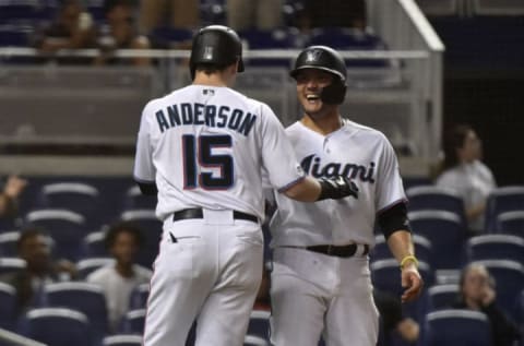 MIAMI, FL – JULY 31: Brian Anderson #15 of the Miami Marlins celebrates with Miguel Rojas #19. (Photo by Eric Espada/Getty Images)