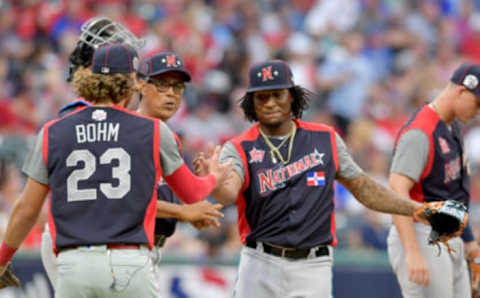 CLEVELAND, OHIO – JULY 07: Alec Bohm #23 celebrates with pitcher Sixto Sanchez #45 as Sanchez leaves the game during the fifth inning against the American League during the All-Stars Futures Game at Progressive Field on July 07, 2019, in Cleveland, Ohio. The American and National League teams tied 2-2. (Photo by Jason Miller/Getty Images)