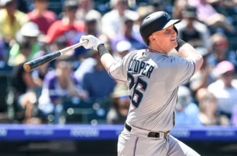 DENVER, CO – AUGUST 18: Garrett Cooper #26 of the Miami Marlins. (Photo by Dustin Bradford/Getty Images)