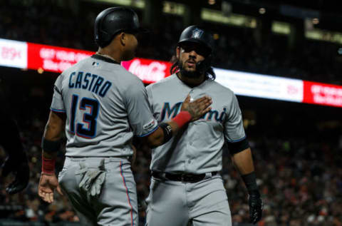 SAN FRANCISCO, CA – SEPTEMBER 14: Jorge Alfaro #38 of the Miami Marlins is congratulated by Starlin Castro #13. (Photo by Jason O. Watson/Getty Images)