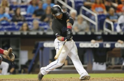 MIAMI, FLORIDA – SEPTEMBER 21: Harold Ramirez #47 of the Miami Marlins singles in the eighth inning against the Washington Nationals at Marlins Park on September 21, 2019 in Miami, Florida. (Photo by Michael Reaves/Getty Images)