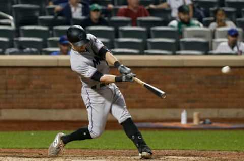 NEW YORK, NEW YORK – SEPTEMBER 23: Jon Berti #55 of the Miami Marlins connects on a ninth inning base hit against the New York Mets at Citi Field on September 23, 2019 in New York City. (Photo by Jim McIsaac/Getty Images)