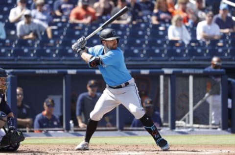 WEST PALM BEACH, FL – MARCH 04: Jon Berti #5 of the Miami Marlins squeezed out by Peter Bourjos? (Photo by Joe Robbins/Getty Images)