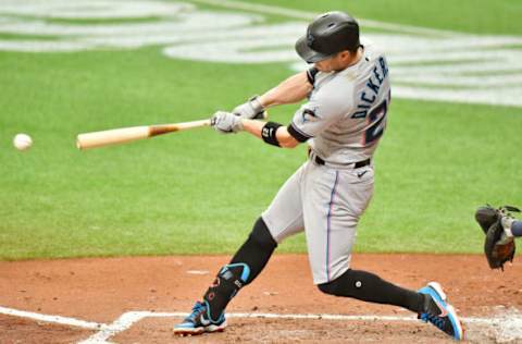 ST PETERSBURG, FLORIDA – SEPTEMBER 06: Corey Dickerson #23 of the Miami Marlins connects for a triple off of Tyler Glasnow of the Tampa Bay Rays during the third inning at Tropicana Field on September 06, 2020 in St Petersburg, Florida. (Photo by Julio Aguilar/Getty Images)