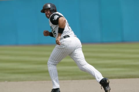 14 Apr 2002: Kevin Millar # 15 of the Florida Marlins in action against the Atlanta Braves at Pro Player Stadium in Miami Florida. The Marlins won 7-0. DIGITAL IMAGE Mandatory Credit: Eliot Schechter/Getty Images