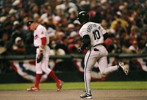 21 Oct 1997: Third Baseman Matt Williams of the Cleveland Indians (left) stands dejected with outfielder Gary Sheffield of the Florida Marlins rounding the bases during the third game of the World Series at Jacobs Field in Cleveland, Ohio. The Marlins won the game 14-11. Mandatory Credit: Doug Pensinger /Allsport