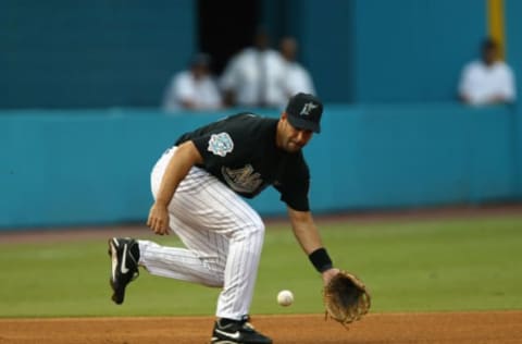 MIAMI – AUGUST 2: Third baseman Mike Lowell #19 of the Florida Marlins fields a ground ball against the Houston Astros during the National League game at Pro Player Stadium on August 2, 2003 in Miami Florida. The Marlins won 5-2. (Photo by Eliot J. Schechter/Getty Images