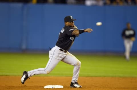 BRONX, NY – OCTOBER 18: Second baseman Luis Castillo #1 of the Florida Marlins throws the ball to first base during game 1 of the Major League Baseball World Series against the New York Yankees on October 18, 2003 at Yankee Stadium in the Bronx, New York. The Marlins won 3-2. (Photo by Ezra Shaw/Getty Images)