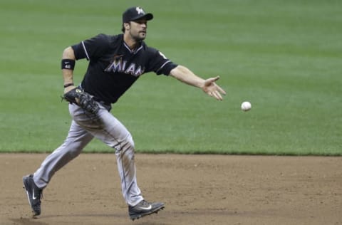 MILWAUKEE, WI – SEPTEMBER 09: Garrett Jones #46 of the Miami Marlins flips the ball to first base to retire Lyle Overbay of the Milwaukee Brewers during the bottom of the sixth inning at Miller Park on September 09, 2014 in Milwaukee, Wisconsin. (Photo by Mike McGinnis/Getty Images)