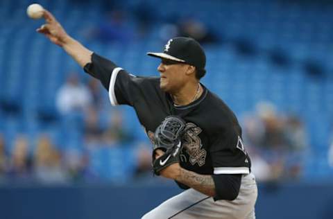 TORONTO, CANADA – MAY 25: Hector Noesi #48 of the Chicago White Sox delivers a pitch in the fourth inning during MLB game action against the Toronto Blue Jays on May 25, 2015 at Rogers Centre in Toronto, Ontario, Canada. (Photo by Tom Szczerbowski/Getty Images)