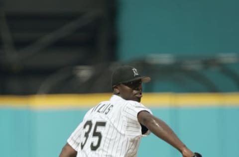 MIAMI – JULY 11: Pitcher Dontrelle Willis #35 of the Florida Marlins reaches back as he prepares to throw a pitch during the game against the New York Mets at Pro Player Stadium on July 11, 2004 in Miami, Florida. The Marlins defeated the Mets 5-2. (Photo by Eliot J. Schechter/Getty Images)