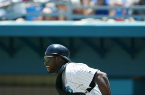 MIAMI – APRIL 28 : Catcher Charles Johnson #23 of the Florida Marlins runs after a batted ball during the MLB game against the Arizona Diamondbacks at Pro Player Stadium in Miami, Florida on April 28, 2002. The Diamondbacks won 5-4. (Photo by Eliot Schechter/Getty Images)