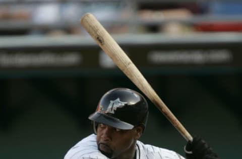 MIAMI – JULY 4: First baseman Carlos Delgado #25 of the Florida Marlins swings at a Milwaukee Brewers pitch during the game on July 4, 2005 at Dolphins Stadium in Miami, Florida. The Brewers won 3-2. (Photo by Eliot J. Schechter/Getty Images)