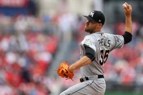 WASHINGTON, DC – APRIL 3: David Phelps #35 of the Miami Marlins pitches against the Washington Nationals in the seventh inning of the opening day game at Nationals Park on April 3, 2017 in Washington, DC. (Photo by Matt Hazlett/Getty Images)