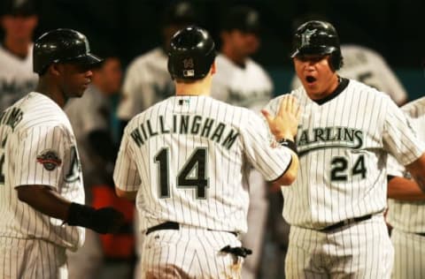 MIAMI – JUNE 12: Miguel Cabrera #24 & Josh Willingham #14 of the Florida Marlins. (Photo by Doug Benc/Getty Images)