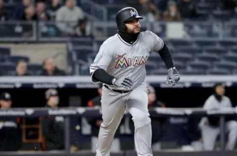 NEW YORK, NY – APRIL 17: Tomas Telis #18 of the Miami Marlins hits an RBI single in the eighth inning against the New York Yankees at Yankee Stadium on April 17, 2018 in the Bronx borough of New York City. (Photo by Elsa/Getty Images)