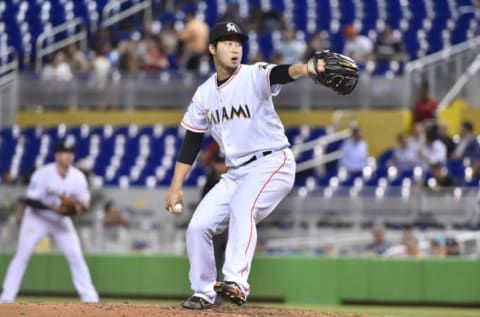 MIAMI, FL – MAY 16: Junichi Tazawa #25 of the Miami Marlins throws a pitch during the sixth inning against the Los Angeles Dodgers at Marlins Park on May 16, 2018 in Miami, Florida. (Photo by Eric Espada/Getty Images)