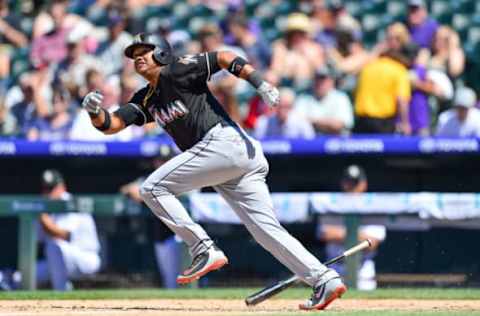 DENVER, CO – JUNE 23: Starlin Castro #13 of the Miami Marlins runs for an infield single in the seventh inning of a game against the Colorado Rockies at Coors Field on June 23, 2018 in Denver, Colorado. (Photo by Dustin Bradford/Getty Images)