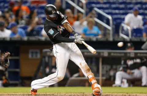 MIAMI, FL – JUNE 29: Lewis Brinson #9 of the Miami Marlins doubles in the sixth inning against the New York Mets at Marlins Park on June 29, 2018 in Miami, Florida. (Photo by Michael Reaves/Getty Images)