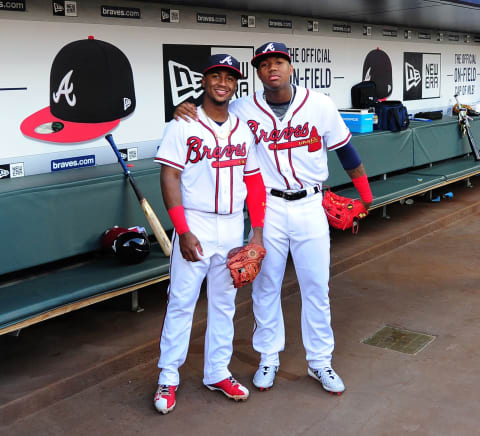 ATLANTA, GA – MAY 4: Ozzie Albies #1 and Ronald Acuna, Jr. #13 of the Atlanta Braves pose for a photo in the dugout before the game against the San Francisco Giants at SunTrust Park on May 4, 2018 in Atlanta, Georgia. (Photo by Scott Cunningham/Getty Images)