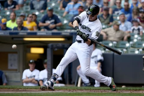 MILWAUKEE, WI – MAY 27: Christian Yelich #22 of the Milwaukee Brewers hits a single in the first inning against the New York Mets at Miller Park on May 27, 2018 in Milwaukee, Wisconsin. (Photo by Dylan Buell/Getty Images)