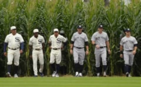 DYERSVILLE, IA – AUGUST 12: Players from the Chicago White Sox and New York Yankees walk though the corn rows while being introduced prior to the game on August 12, 2021 at Field of Dreams in Dyersville, Iowa. (Photo by Ron Vesely/Getty Images)