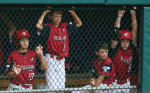 WILLIAMSPORT, PENNSYLVANIA – AUGUST 29: Team Ohio players watch from the dugout in the fifth inning of the 2021 Little League World Series against Team Michigan at Howard J. Lamade Stadium on August 29, 2021 in Williamsport, Pennsylvania. (Photo by Joshua Bessex/Getty Images)