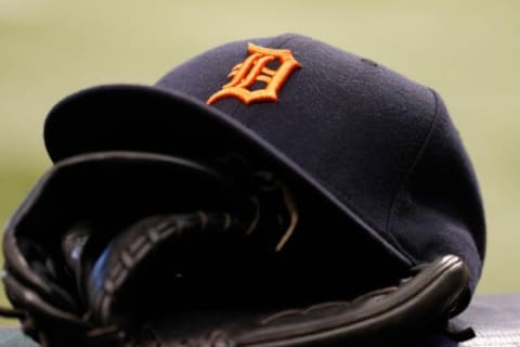 Aug 20, 2014; St. Petersburg, FL, USA; Detroit Tigers hat and glove in the dugout against the Tampa Bay Rays at Tropicana Field. Mandatory Credit: Kim Klement-USA TODAY Sports