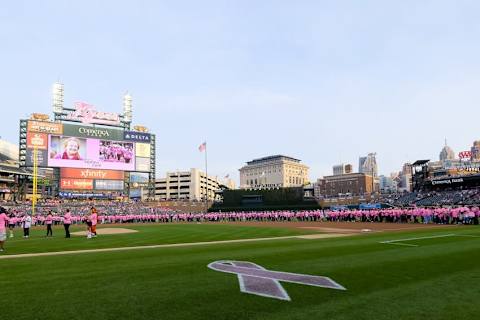 Sep 18, 2015; Detroit, MI, USA; Cancer survivors line the field prior to the game between the Detroit Tigers and the Kansas City Royals at Comerica Park. Mandatory Credit: Rick Osentoski-USA TODAY Sports