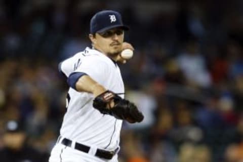 Aug 25, 2015; Detroit, MI, USA; Detroit Tigers relief pitcher Blaine Hardy (65) makes a throw to first in the eighth inning against the Los Angeles Angels at Comerica Park. Mandatory Credit: Rick Osentoski-USA TODAY Sports