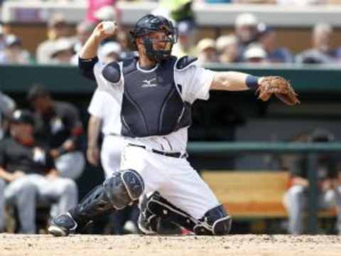 Mar 25, 2015; Lakeland, FL, USA; Detroit Tigers catcher Bryan Holaday (50) throws back to the mound during the third inning of a spring training baseball game against the Miami Marlins at Joker Marchant Stadium. Mandatory Credit: Reinhold Matay-USA TODAY Sports