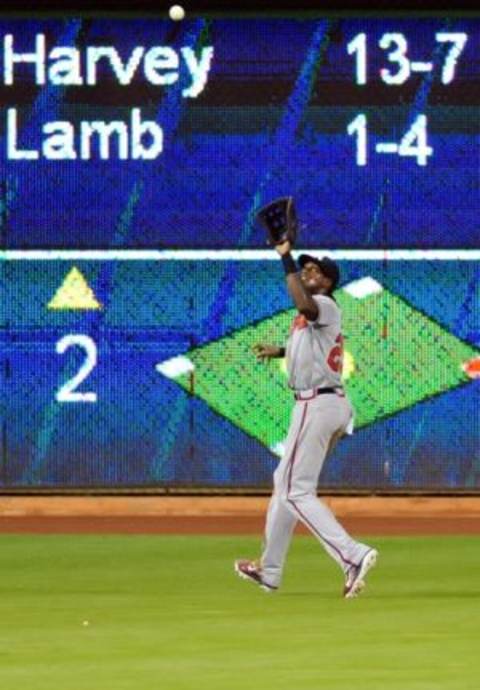 Sep 26, 2015; Miami, FL, USA; Atlanta Braves center fielder Cameron Maybin (25) makes a catch during the third inning against the Miami Marlins at Marlins Park. Mandatory Credit: Steve Mitchell-USA TODAY Sports